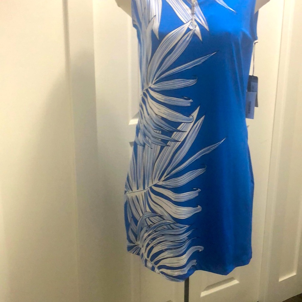 This is a teal dress brand, new blue and white